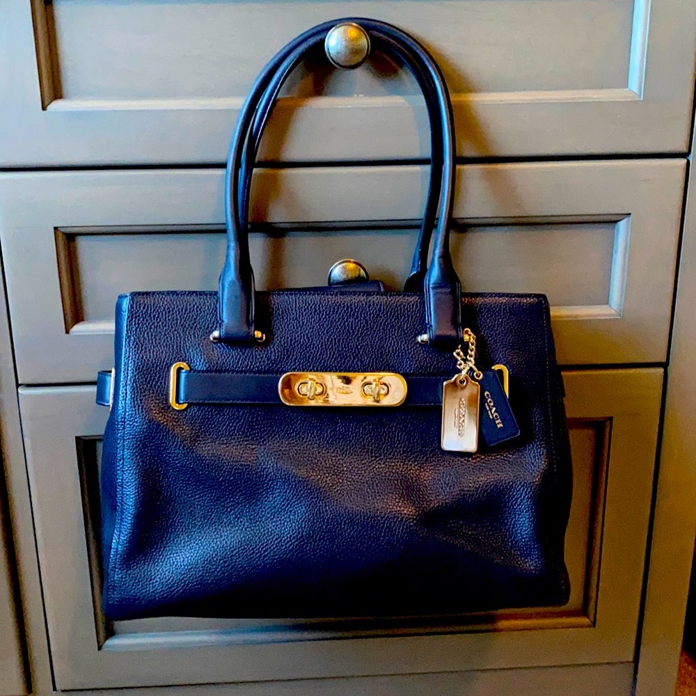 Large navy blue with gold accents coach handbag